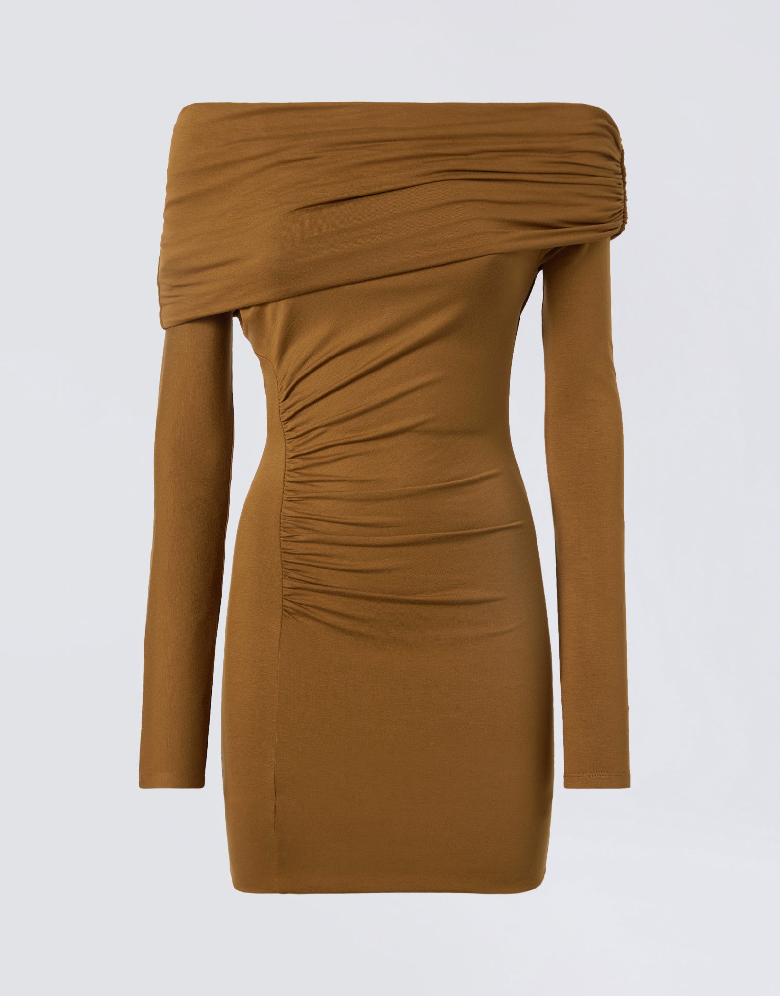 Frontal view showing Zoe Mini Dress in light brown jersey fabric, featuring one-shoulder wrap design, long sleeves, and side draping detail for texture.