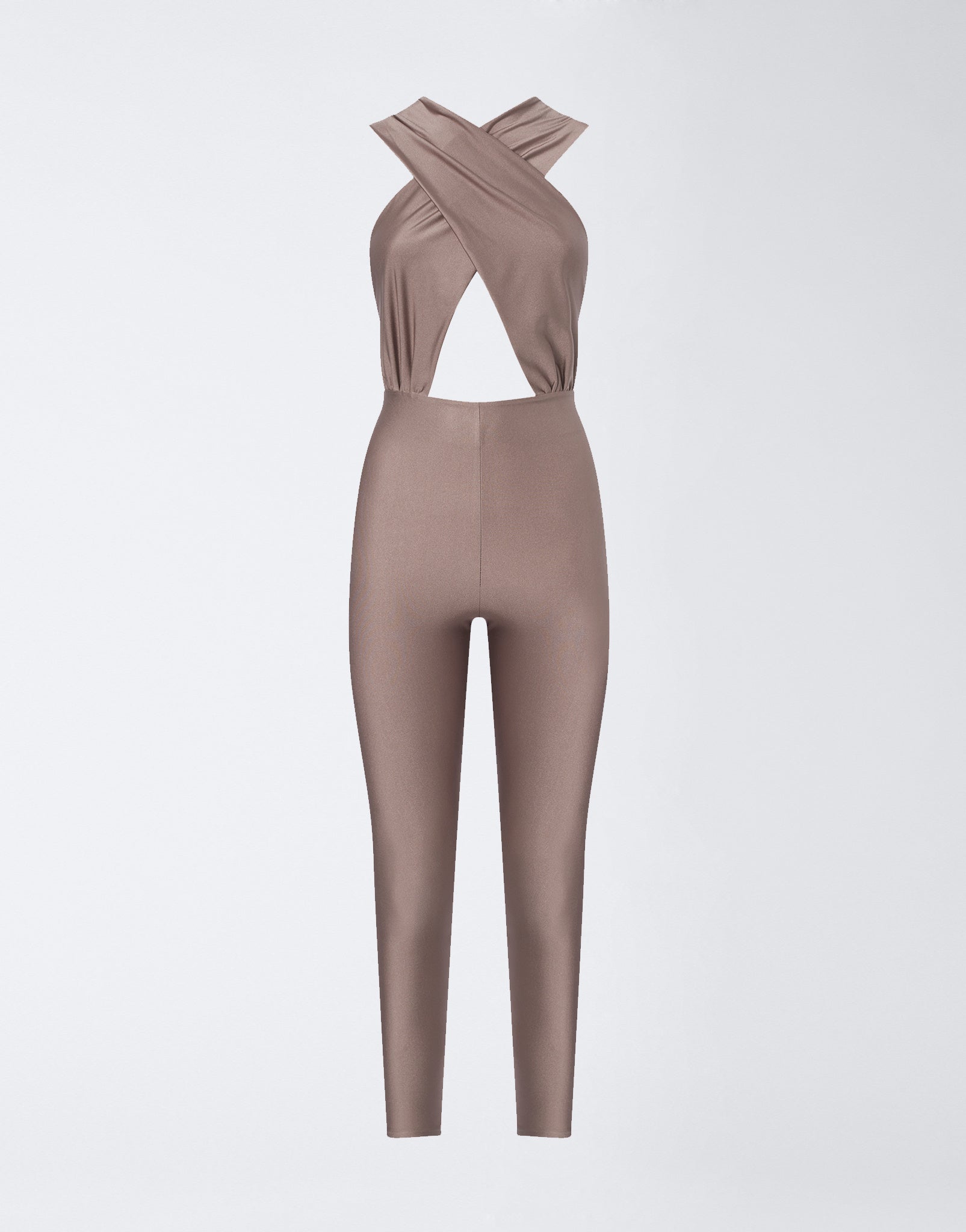 Frontal view of the Hola Jumpsuit featuring greige shiny lycra, a crossover halterneck, triangular cut-out front, and full-length, fitted leggings.