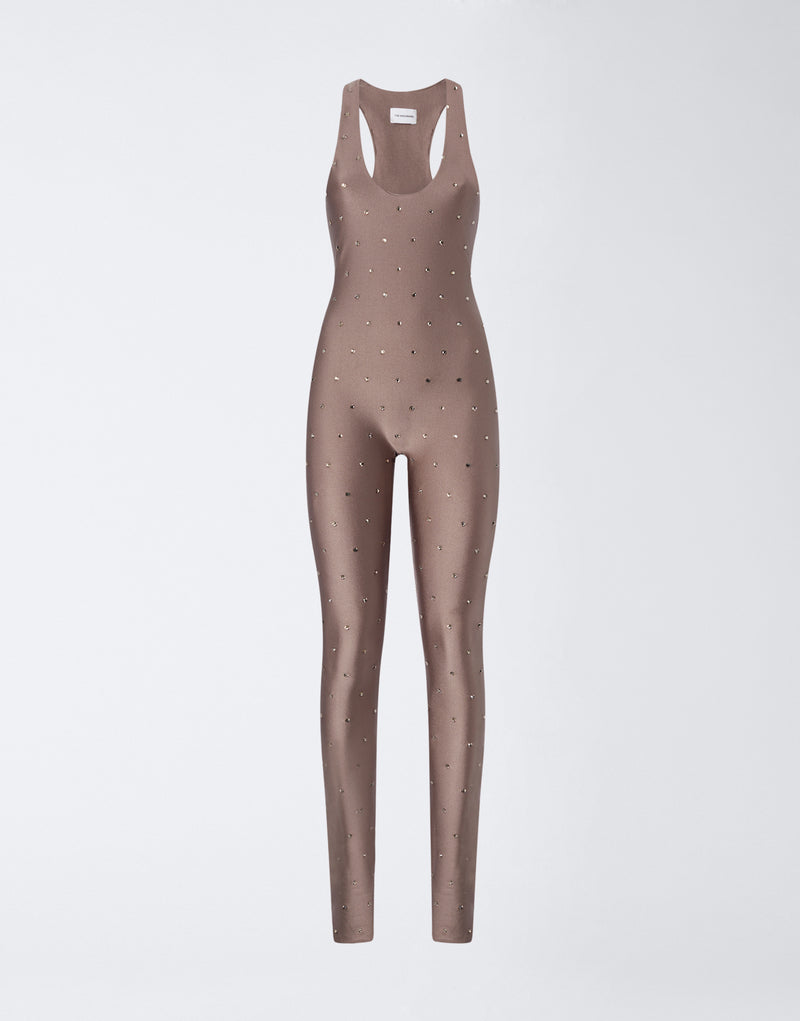 
                          Frontal view: Tess Crystal Jumpsuit features greige shiny lycra, thin straps, scoop neck, sleeveless design, all-over tone-on-tone crystals, and subtle flared ankles.
                        