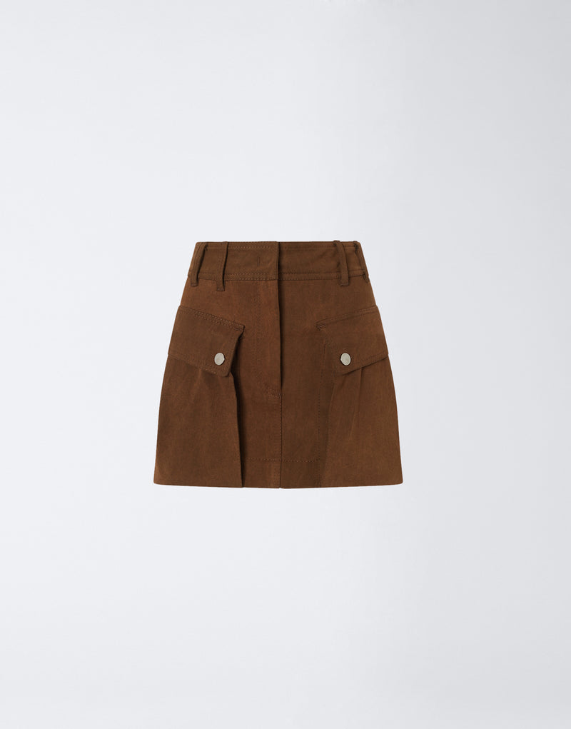 
                          Frontal view shows the Xandra Mini Skirt in cigar-colored cotton with two patch pockets, belt loops, and snap-button closures, highlighting its structured cargo style.
                        