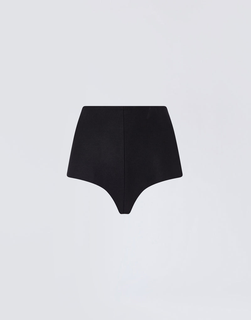 
                          Frontal view of Tami Culottes, crafted from black felted wool, featuring a high waist, structured silhouette, and minimal seam detail against a plain background.
                        