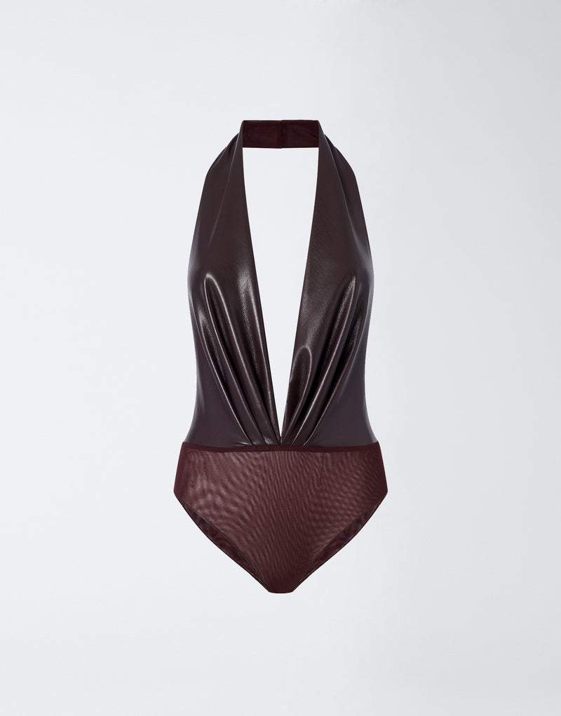 
                          Frontal view of the Zendaya Bodysuit in cabernet vegan leather, featuring a plunging V-neck halterneck, sleeveless design, deep front pleats, and button-finished crotch.
                        