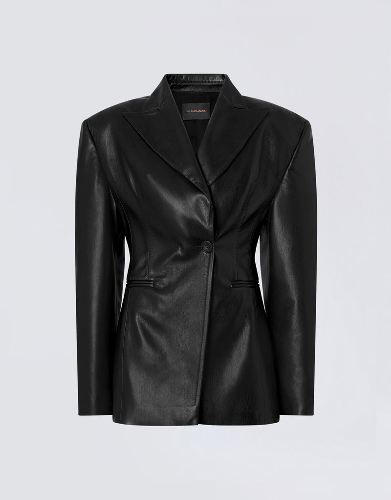 Frontal view of the Ottavia Blazer, a black vegan leather blazer with exaggerated shoulders, a cinched waist, peaked lapels, and a single-button closure.