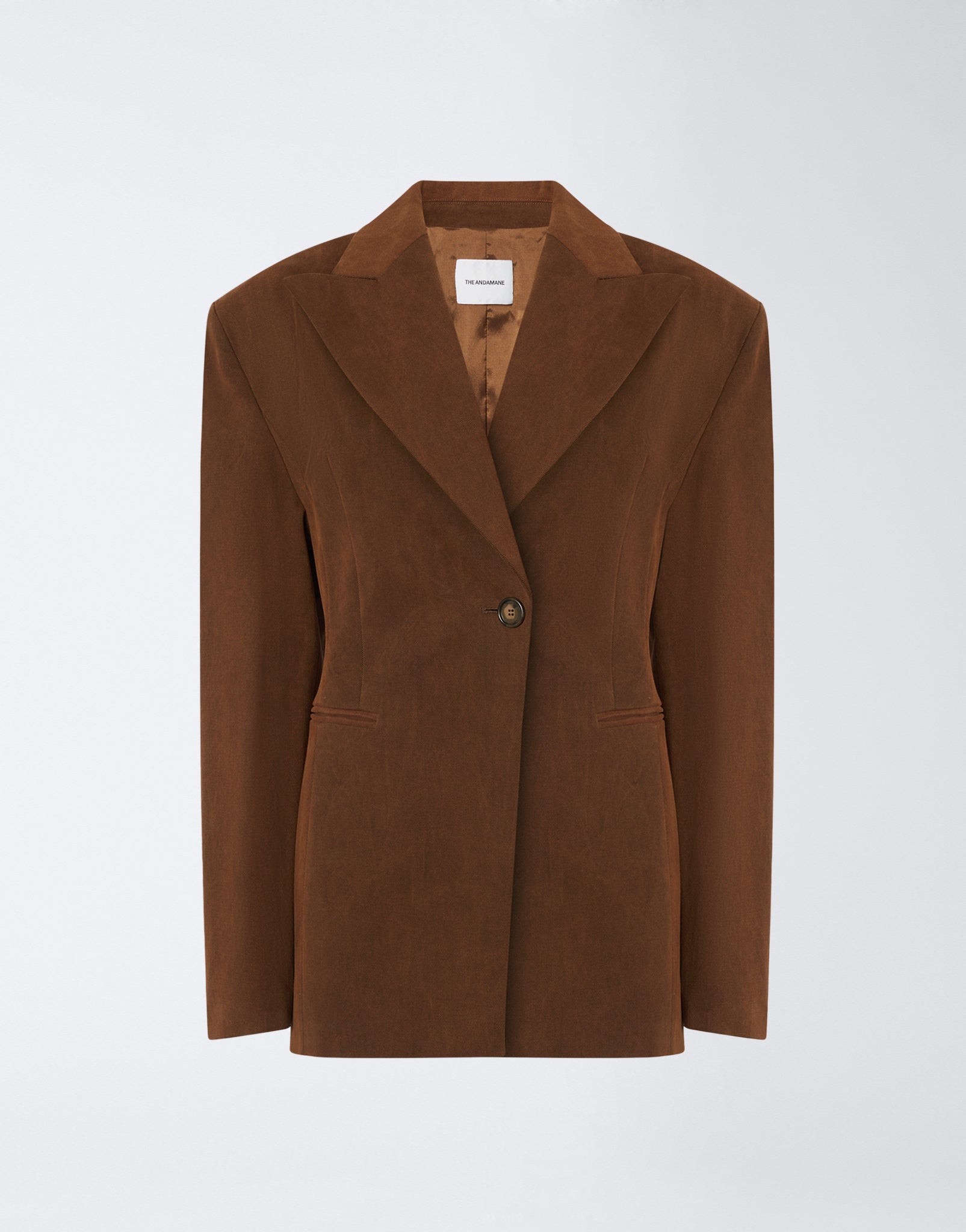 Frontal view shows the Ottavia Blazer in cigar-colored cotton with a single-breasted closure, peaked lapel, cinched waist, padded shoulders, and buttoned cuffs.