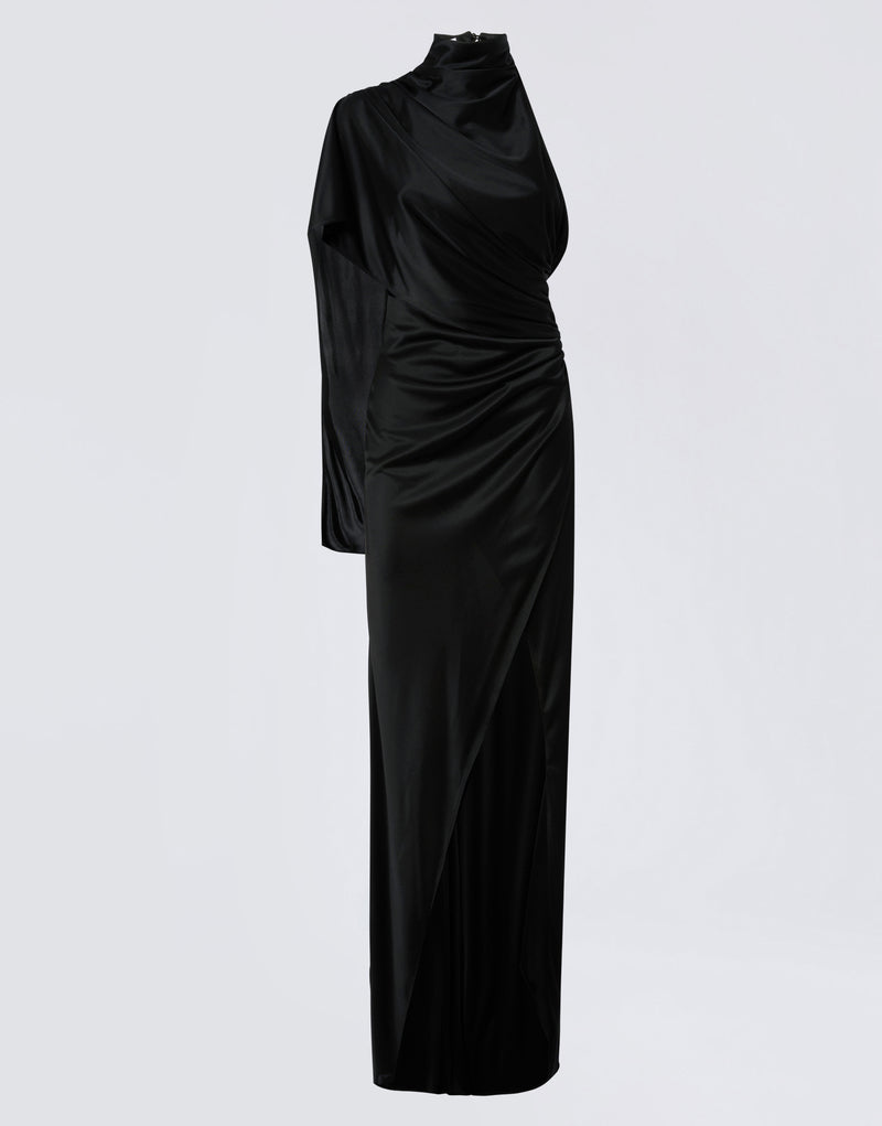 
                          Frontal view of the Waverly Maxi Dress showing a black shiny jersey gown with a turtleneck, cape over one shoulder, and a high-slit maxi skirt.
                        