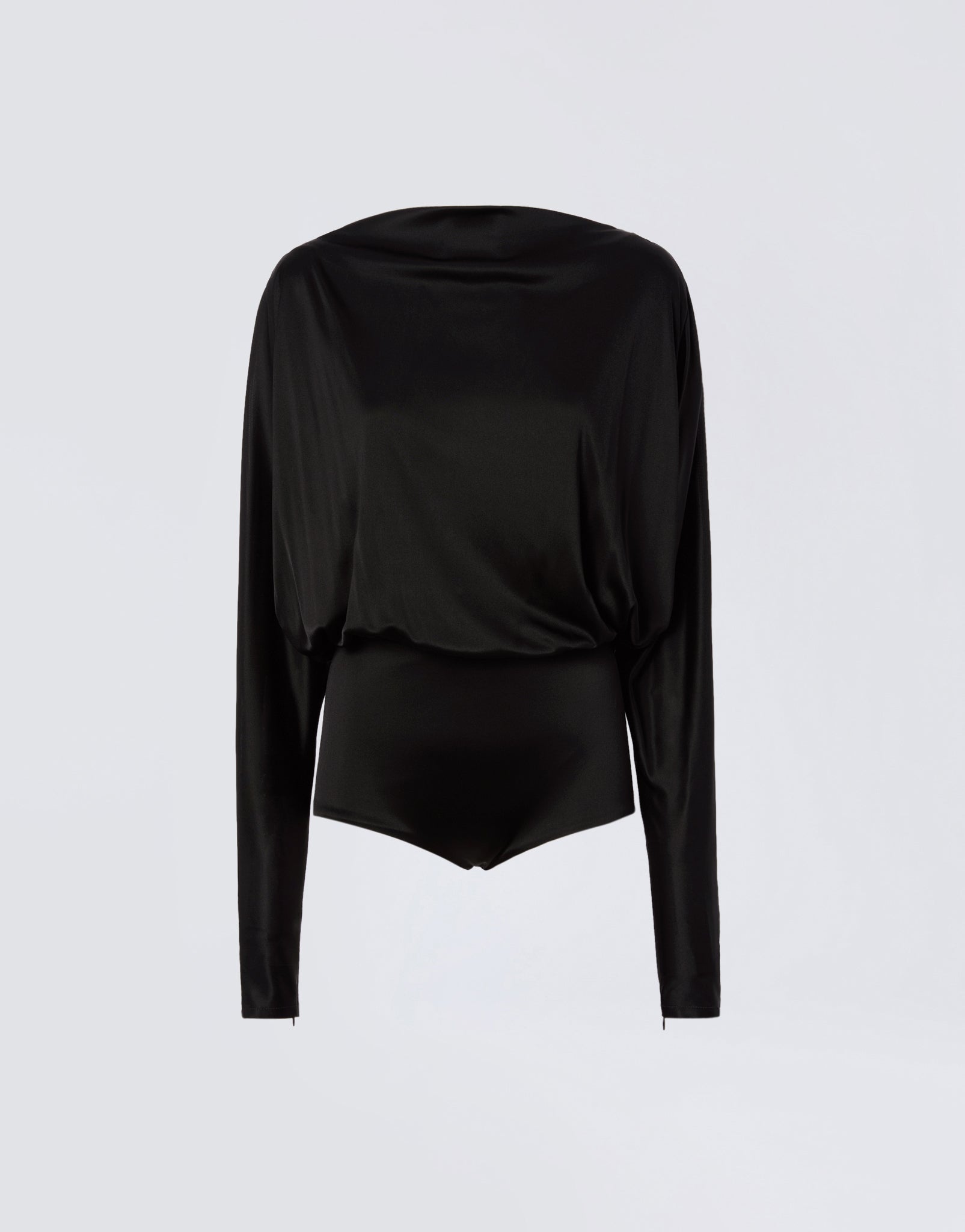 Frontal view of the Winnie Playsuit made from black shiny jersey, featuring a boat neckline, long sleeves, and soft, curved lines against a plain background.
