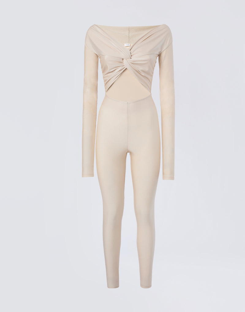 
                          Frontal view of the Kendall Jumpsuit in ivory shiny lycra, off-the-shoulder with long sleeves, knot detail, front cut-out, and form-fitting leggings.
                        