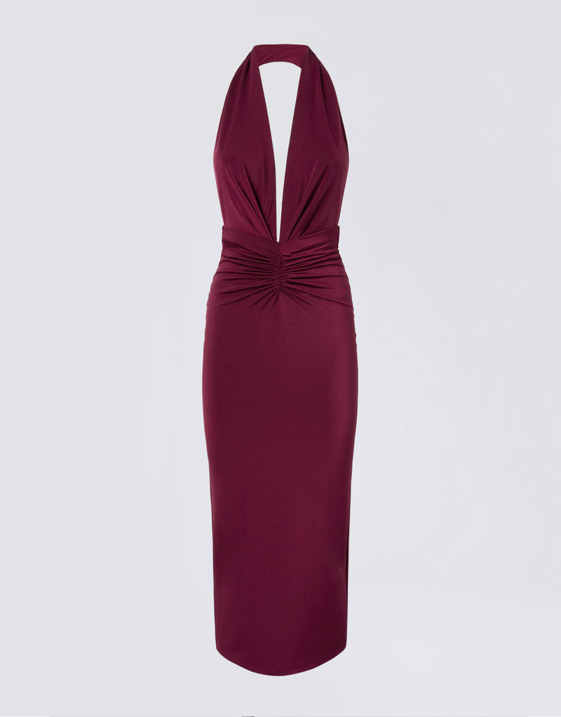 
                          Frontal view of the Zendaya Midi Dress in cabernet lightweight jersey, showcasing a halterneck strap, deep plunging V-neck, ruched waist, and timeless silhouette.
                        