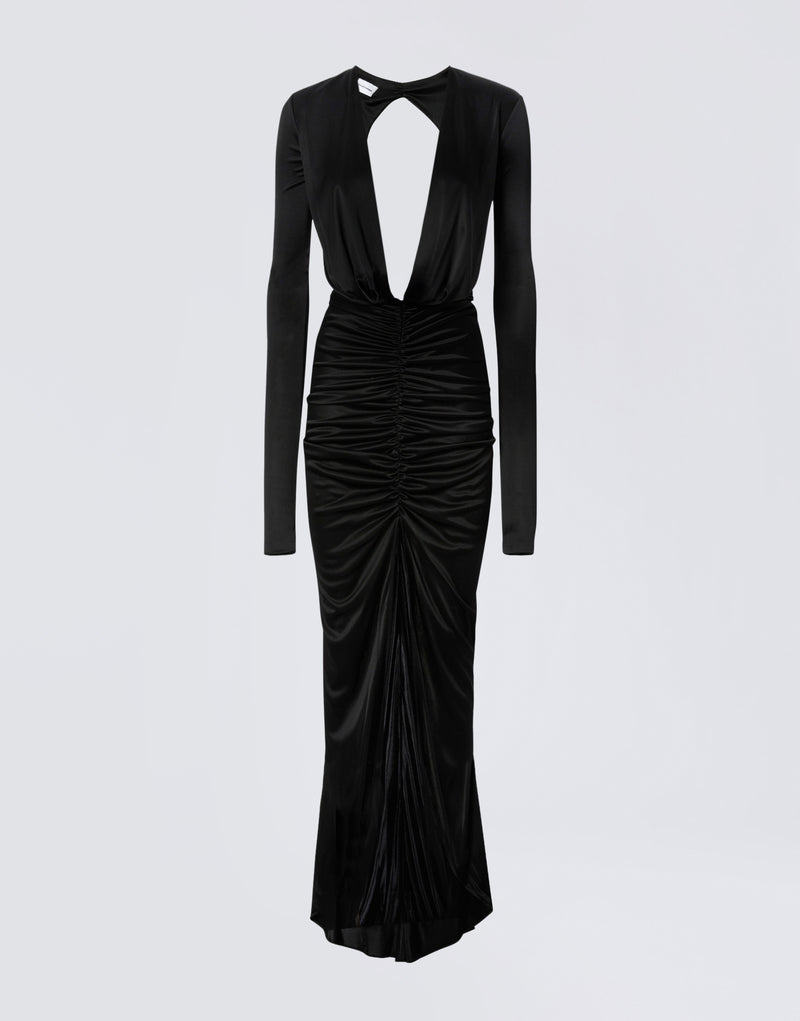 
                          Frontal view of the Zelda Maxi Dress, a black shiny jersey gown with long sleeves, deep plunging V-neck, ruched skirt, and floor-length draped opening.
                        