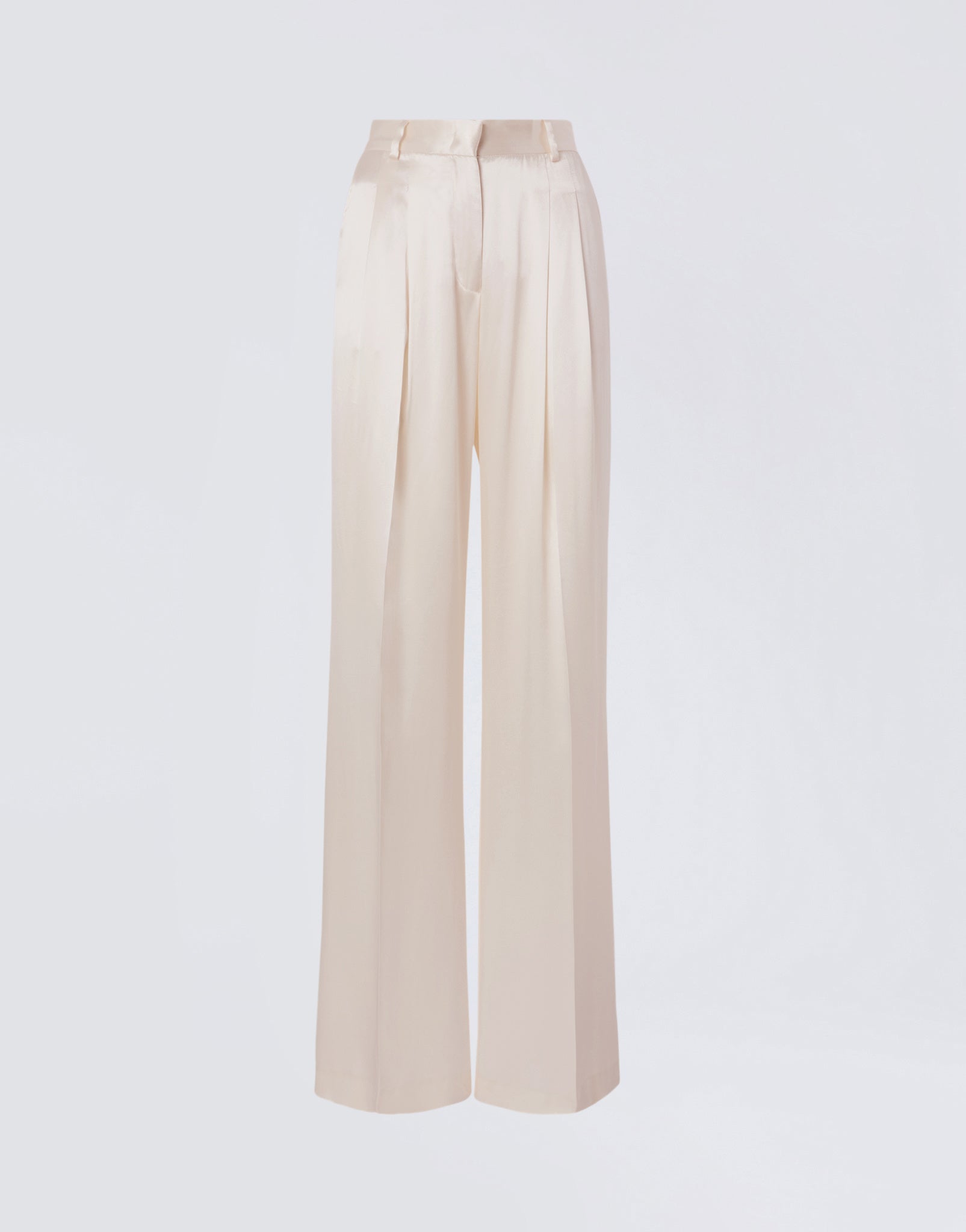 Frontal view of Nathalie Pants showing wide-hem ivory shiny satin trousers with pleats down each leg, high waist, belt loops, and side slit pockets.