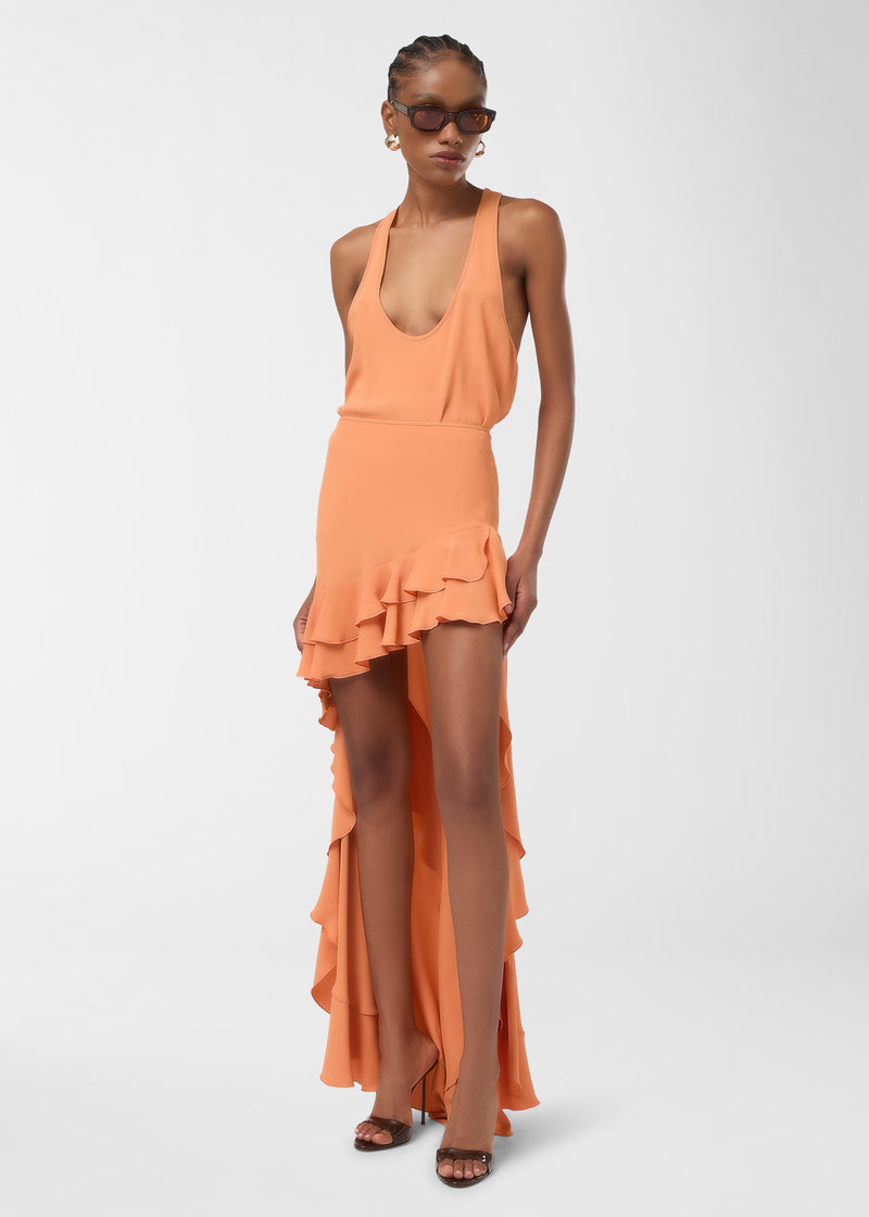 Frontal view: Pura Top — tangerine crepe de chine tank top drapes on model, scooped neckline and racerback frame the shoulders as fabric flows fluidly down the bodice.