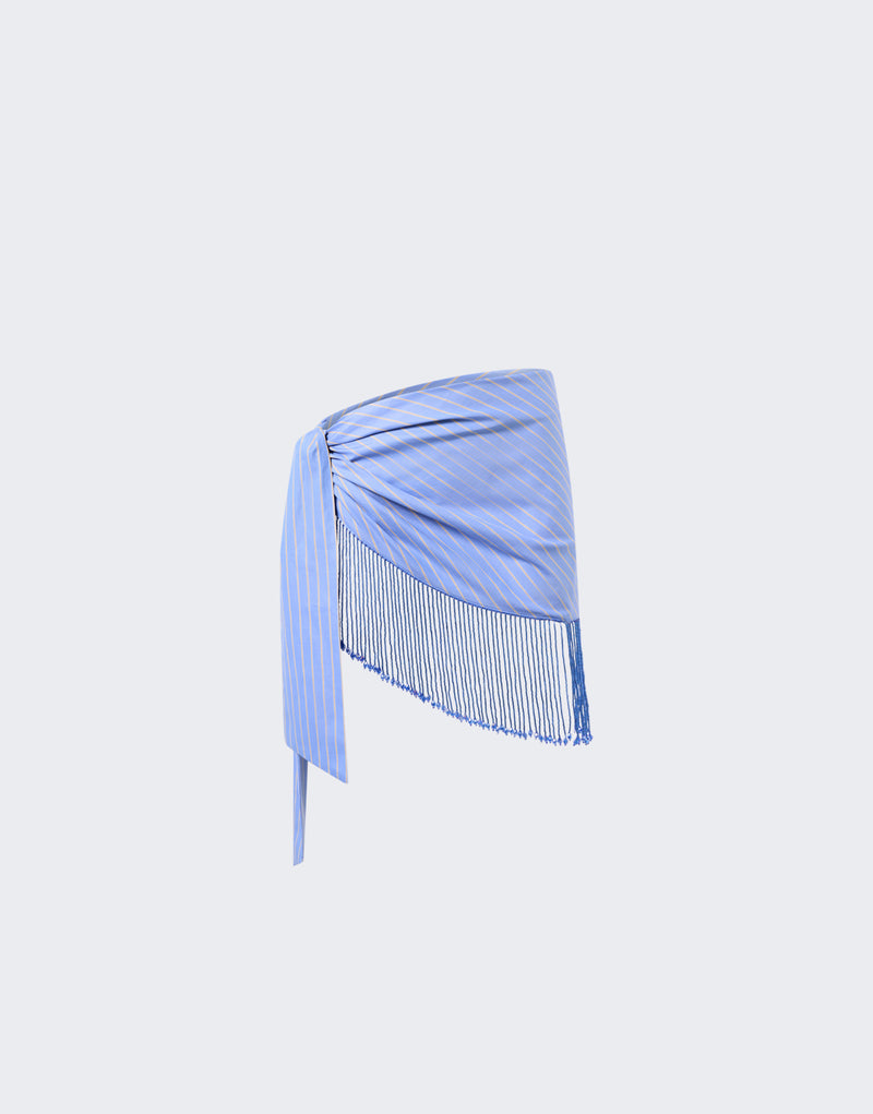 Frontal view — Dolly Pareo wraps around a waist, knotted at one side with draped pleating, light-blue with saffron stripes and long bejeweled fringe, shown on a neutral background.